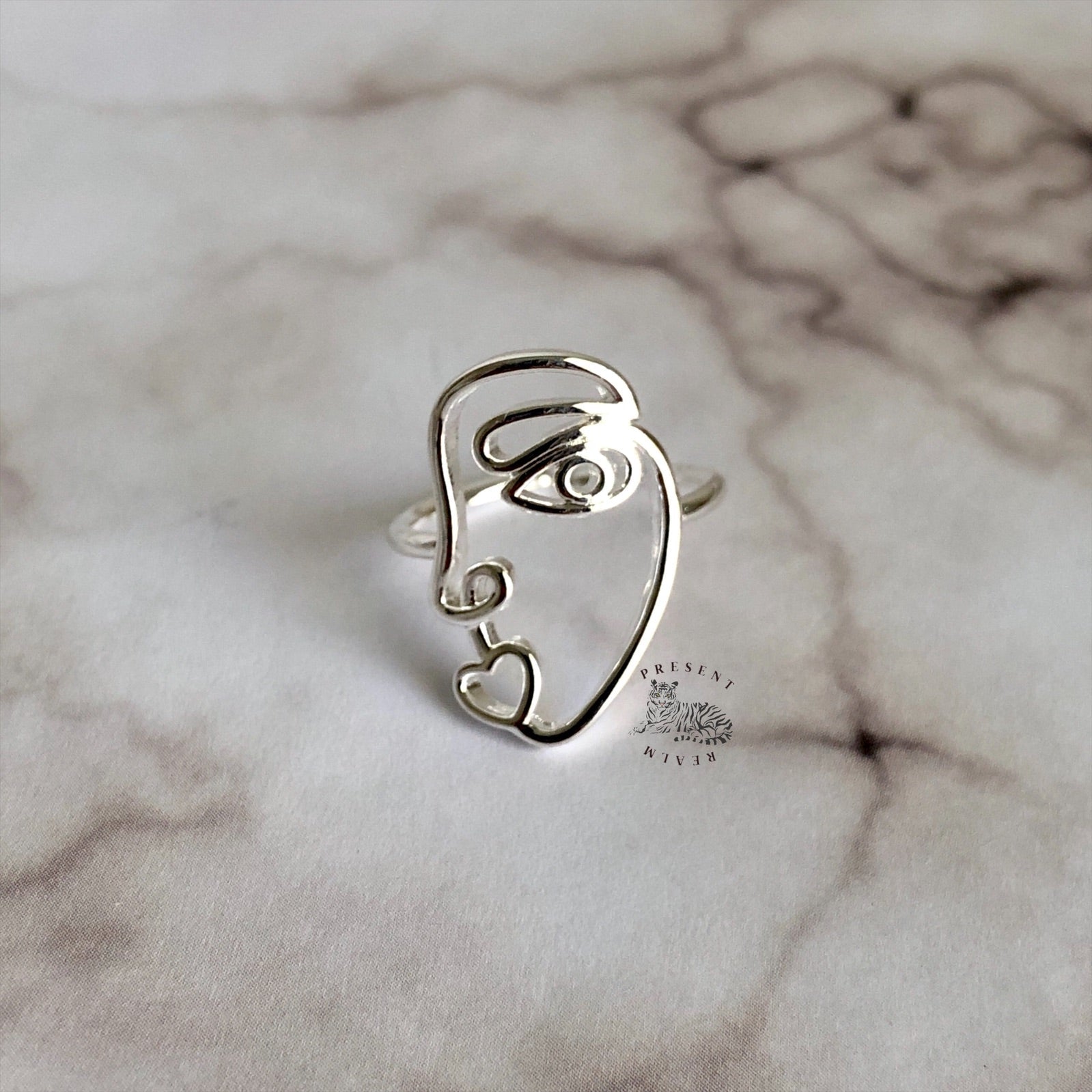 Present Realm Adjustable Rings