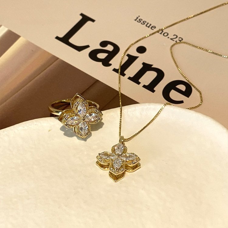 Rotating Four-Leaf Clover Zirconia Ring & Necklace