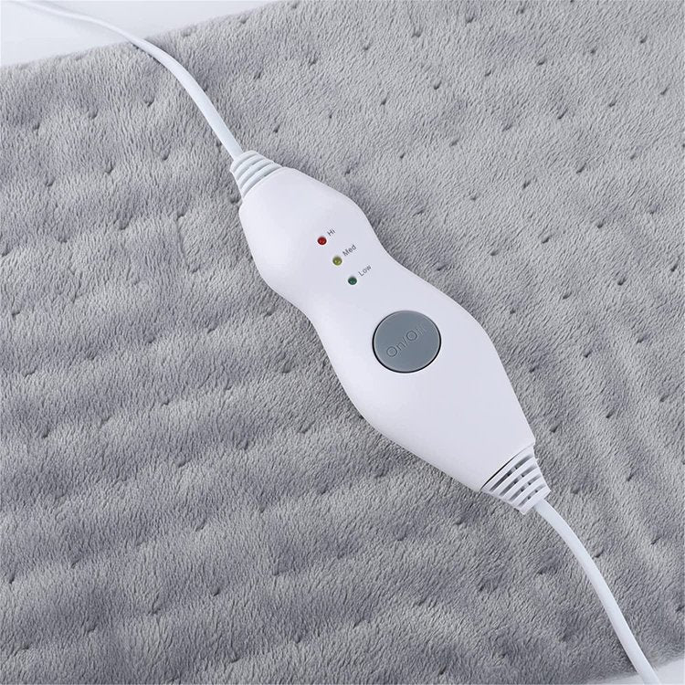 THE REVOLUTIONARY MASSAGE WEIGHTED HEATING PAD