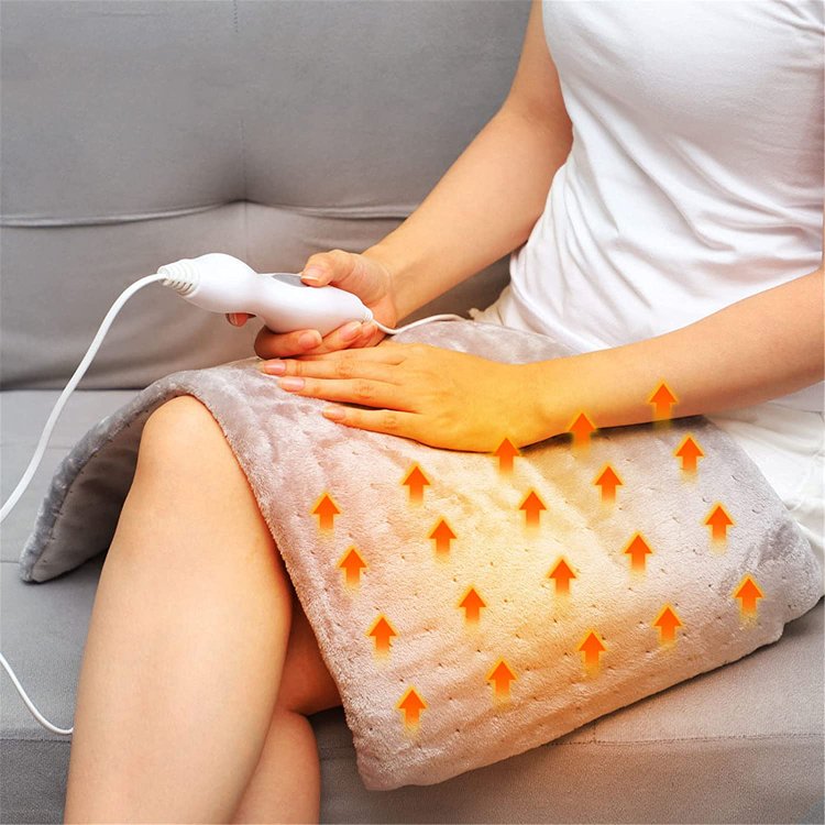 THE REVOLUTIONARY MASSAGE WEIGHTED HEATING PAD