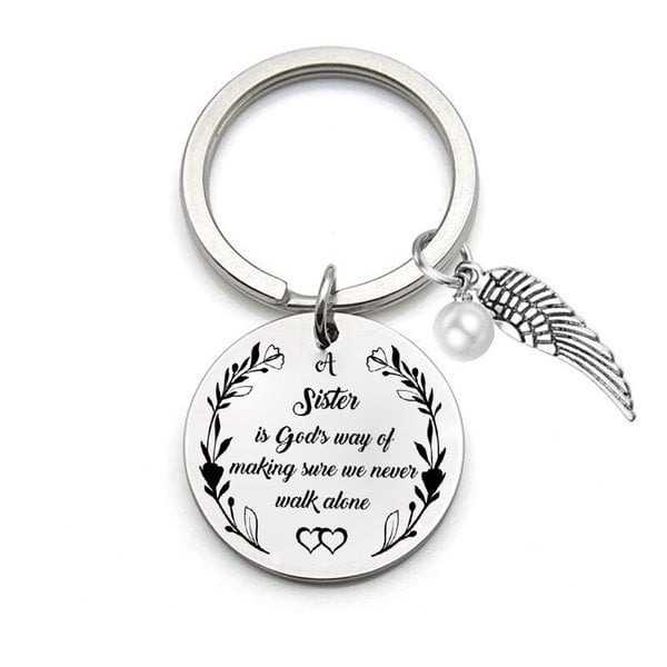 LAST DAY 49% OFF - A Sister is God's Way of Making Sure We Never Walk Alone Keychain