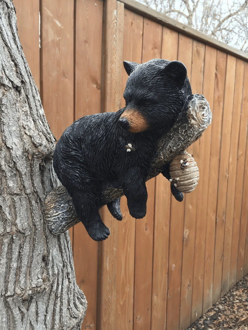 Black Bear Cub Napping Hanging Out in a Tree Figurine