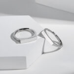 ADJUSTABLE LIGHT SCULPTED RING